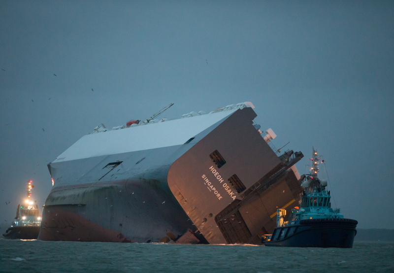 Illustration for article titled These Photos Of That Grounded Car Carrier Ship Are Beautifully Surreal